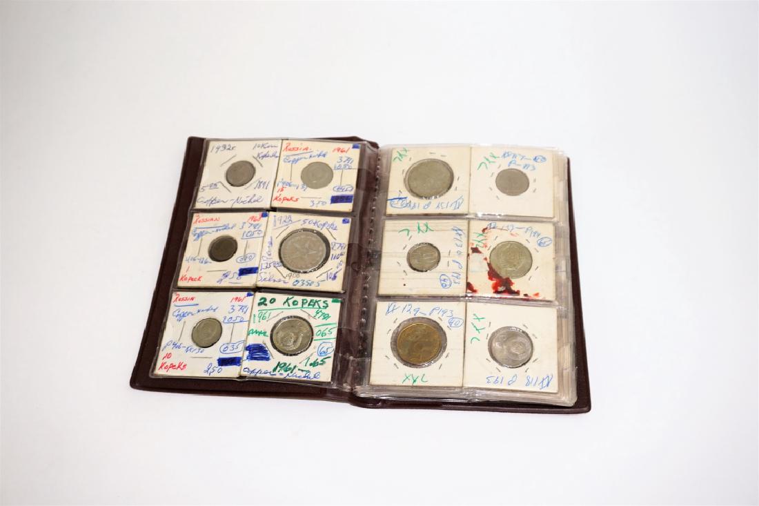 40 ASSORTED FOREIGN COINS IN COIN STOCK BOOK (1 of 3)