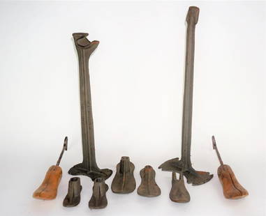 (3) CAST IRON COBBLER'S TOOLS: (3) CAST IRON COBBLER'S TOOLS - Includes (1) Big Boy stand and 1 foot; Cast Iron stand and 4 feet; pair Red Heat shoe stretchers ; Condition - All pieces have rust & 3 of feet are chipped; wood has pa