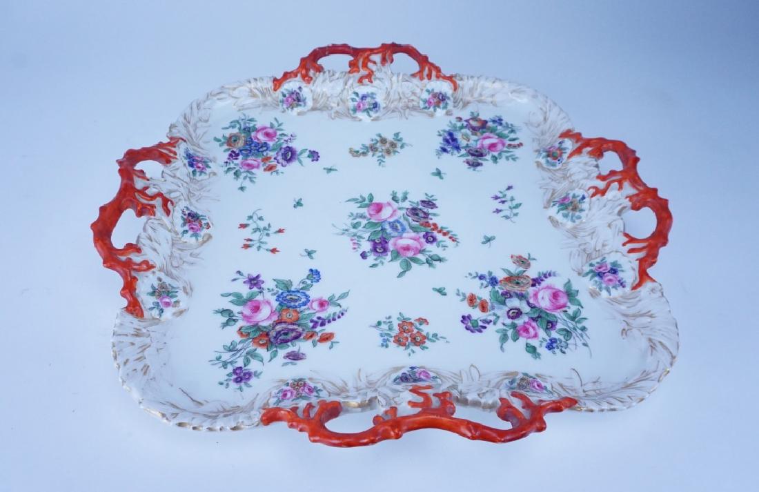 ANTIQUE MEISSEN PORCELAIN 4-HANDLE PLATTER: ANTIQUE MEISSEN PORCELAIN 4-HANDLE PLATTER - Meissen porcelain, multi-color 4-handle platter with floral decoration with gold accents; 4 coral style handles in orange; crossed swords mark on bottom 17