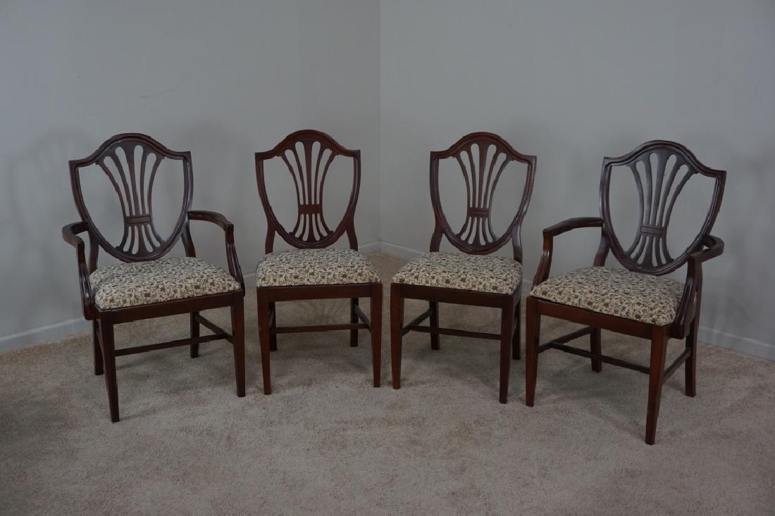 5pc MAHOGANY DINING ROOM SET: 5pc MAHOGANY DINING ROOM SET - Table Includes 1 10" leaf and protective pad, includes 4 shield back chairs (2 arm, 2 side) ; Condition - Some scratches on top of table, residue on top, some separation