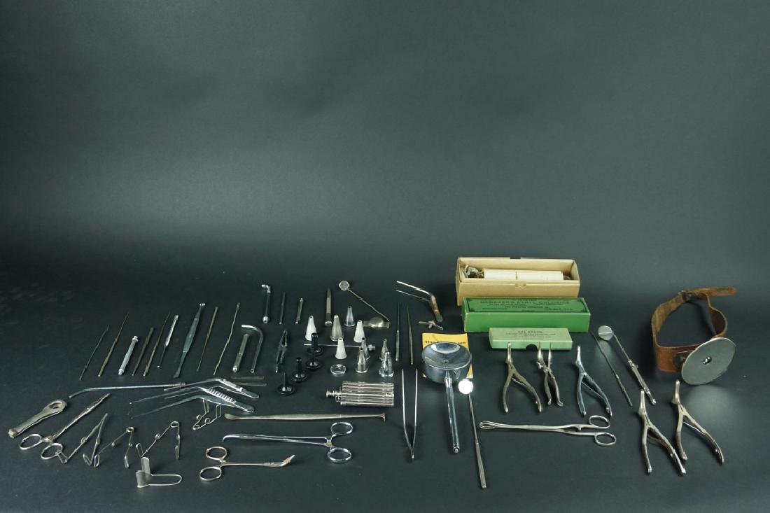 VINTAGE ASSORTED MEDICAL TOOLS: VINTAGE ASSORTED MEDICAL TOOLS - Vintage assorted medical tools; Examples include (1) pre-WW1 Randall Faichney stainless steel syringe; vintage doctor’s head mirror with leather strap; tooth extract