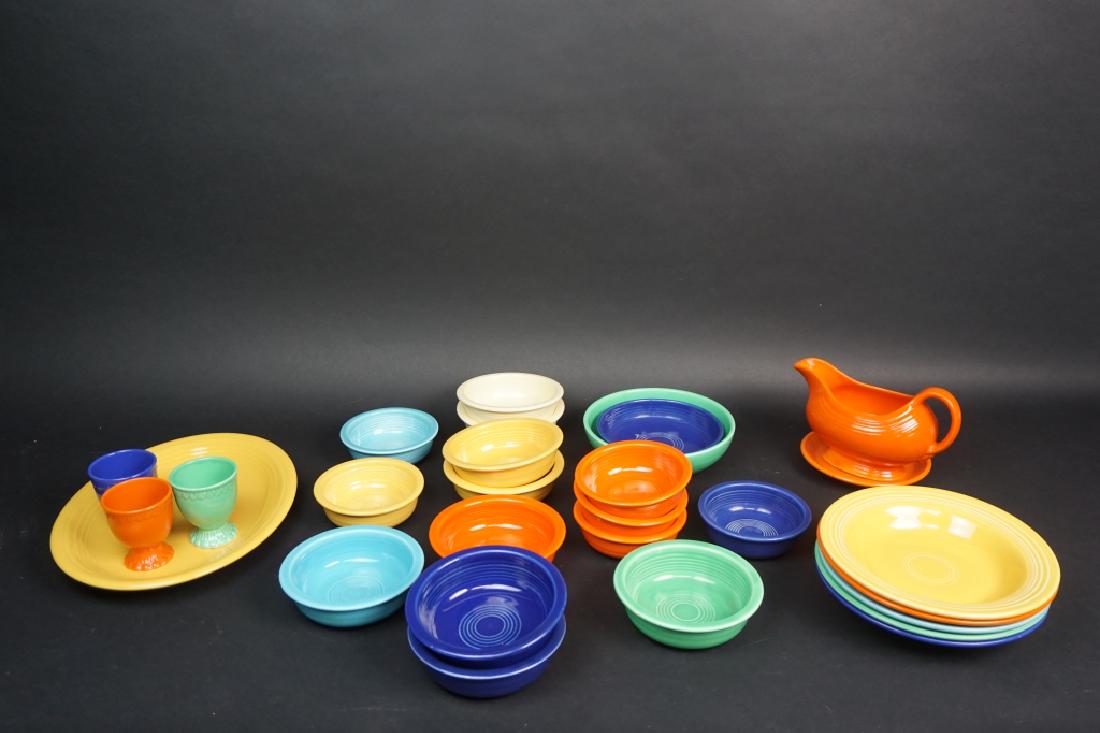 28pcs VINTAGE MODERN FIESTAWARE: 28pcs VINTAGE MODERN FIESTAWARE - Including various bowls, a serving platter, 3 unmarked egg cups and a gravy boat; various different stamps on backs of pieces ; Condition - Good overall condition; Mi