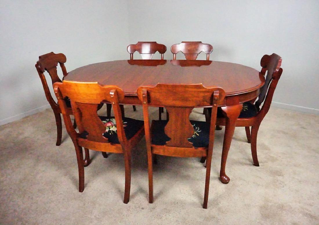 9pc VINTAGE PENNSYLVANIA HOUSE TABLE AND CHAIRS: 9pc VINTAGE PENNSYLVANIA HOUSE TABLE AND CHAIRS - Cherry construction dining room table and chairs; bent rims made by Jefferson Woodworking Co; Queen Anne style table legs; (6) upholstered side chairs