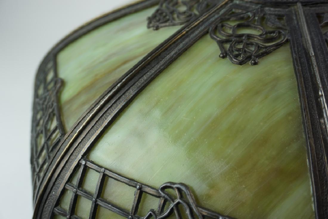 ANTIQUE LEADED SLAG GLASS LAMP SHADE: ANTIQUE LEADED SLAG GLASS LAMP SHADE Has 8 panels of marbleized green and brown slag glass. Fitted panels, set in an ornate floral frame. ; Condition - Good condition overall. ; Measures: H: 7 1/2 D: 