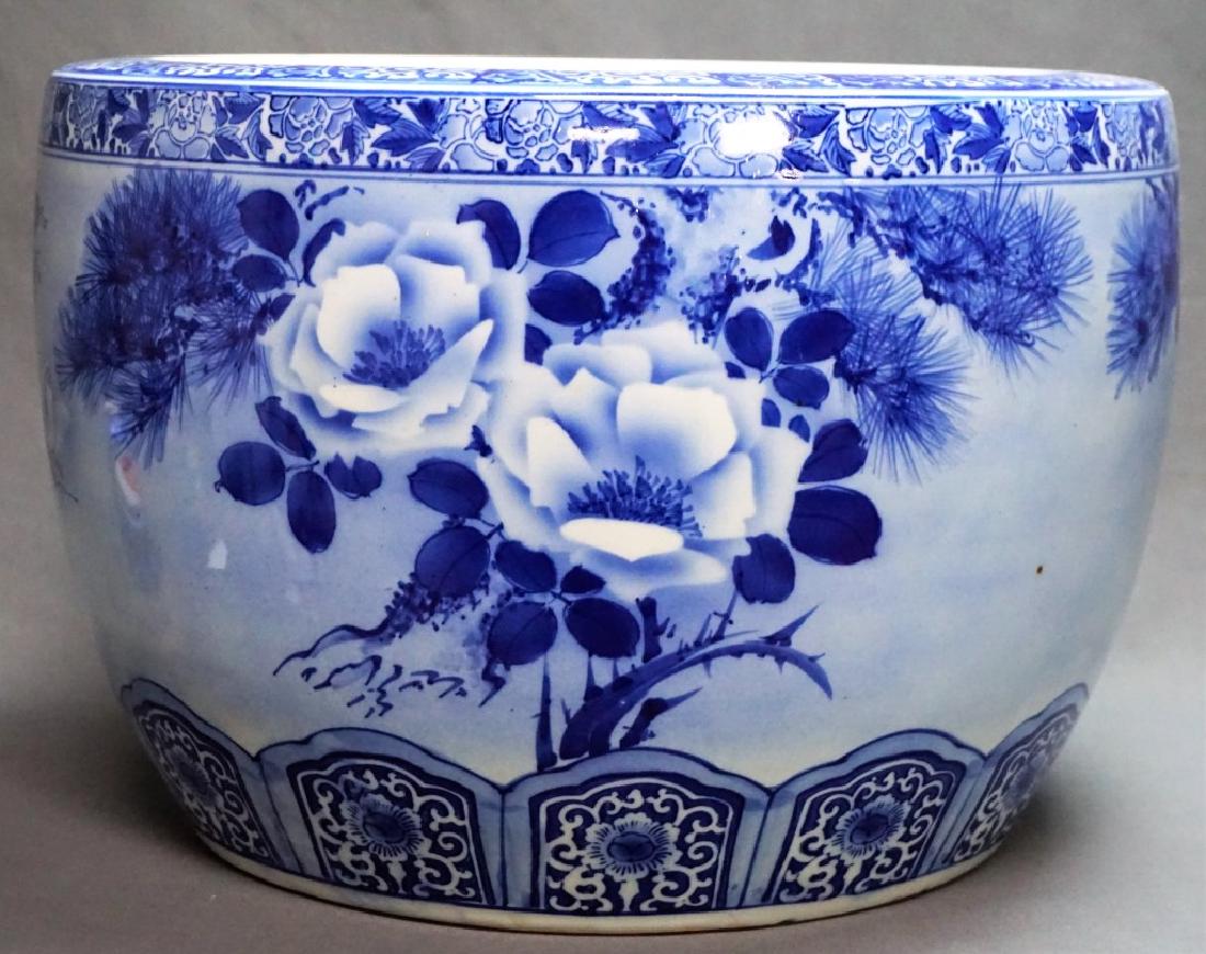 LARGE BLUE & WHITE PORCELAIN FISH BOWL: LARGE BLUE & WHITE PORCELAIN FISH BOWL Blue & white floral and leaf design; Estimate: $200-$400 ; Condition - Very good condition ; Measures: 12"H x 17" diameter