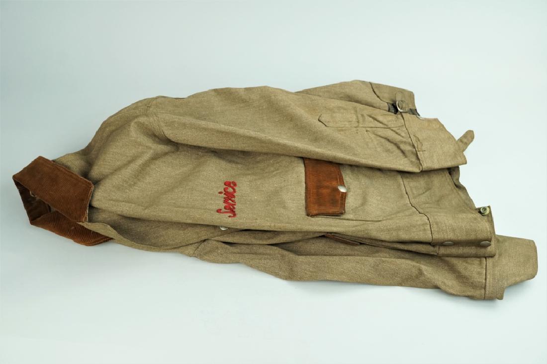 VINTAGE KUNZELMANN & ESSER ADVERTISING JACKET: VINTAGE KUNZELMANN & ESSER ADVERTISING JACKET Has "Kunzelmann & Esser Co" embroidered on back, "Service" embroidered on front left side, Collar and pocket flaps are brown corduroy, sides are adjustabl