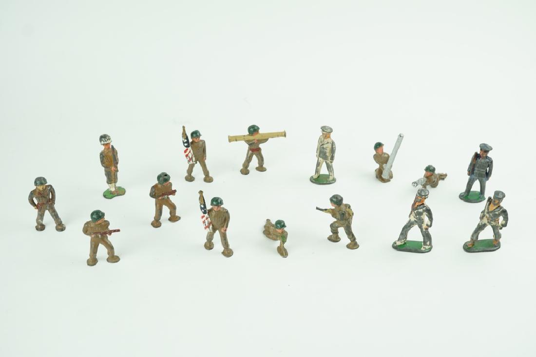 (15) ASSORTED MANOIL WORLD WAR II SOLDIERS: (15) ASSORTED MANOIL WORLD WAR II SOLDIERS All are hollow WWII lead figures. Including sailors, machine gunners and flag bearers. ; Condition - Missing paint. Some have chips. ; Measures: 3.5"H