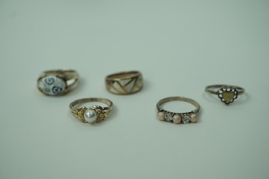 (5) ASSORTED STERLING SILVER RING: (5) ASSORTED STERLING SILVER RINGS – Including (1) inlaid with Abalone, (1) millefiori and (2) with seed pearls ; Measures: Total weight: 21.6g