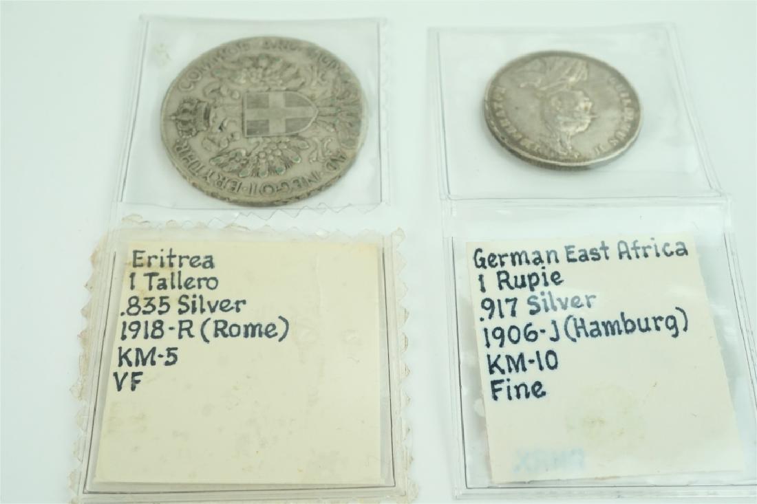 (2) ASSORTED FOREIGN COINS (1 of 5)
