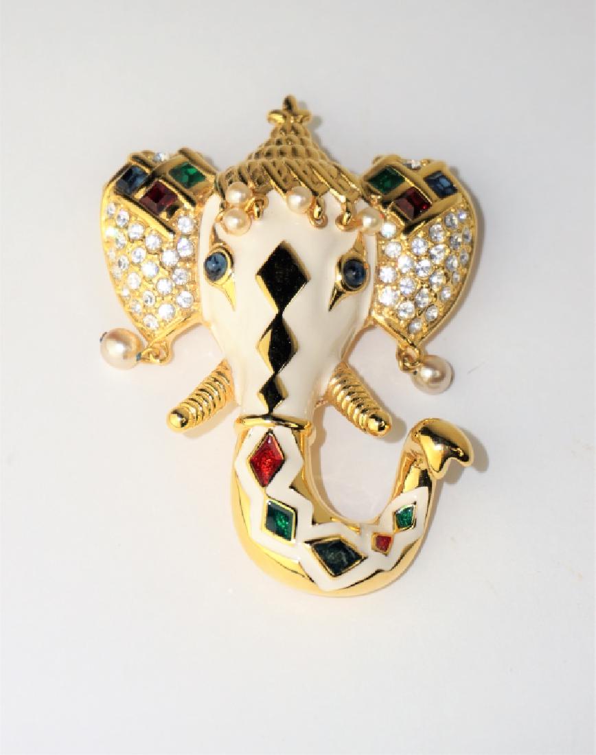 KENNETH JAY LANE ROYAL ELEPHANT BROOCH: KENNETH JAY LANE ROYAL ELEPHANT BROOCH – This elaborate brooch features a white enamel elephant, decorated with green and red enamel diamonds; pearls decorate the face and dangle from ears; crystal,