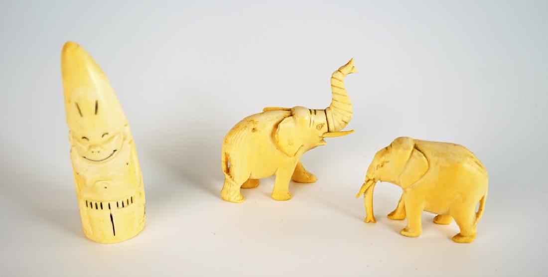 (3) ANTIQUE TRIBAL CARVED BONE FIGURES: (3) ANTIQUE TRIBAL CARVED BONE FIGURES Includes (2) Elephants one with the tusk up and one down, and an tribal figure ; Condition - One tusk is missing ; Measures: 1.5" - 3.5"H