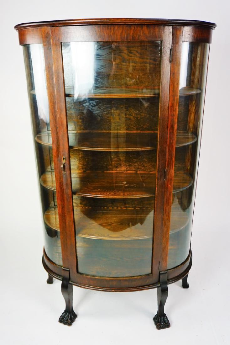 ANTIQUE CURVED GLASS CURIO