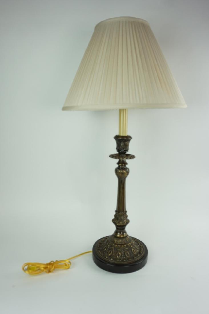FREDERICK COOPER LAMP WITH SHADE: FREDERICK COOPER LAMP WITH SHADE Has embossed floral cast metal body with brass tone patina; includes lamp shade ; Condition - Untested, red mark on shade ; Measures: 34"H x 17.5"W with shade
