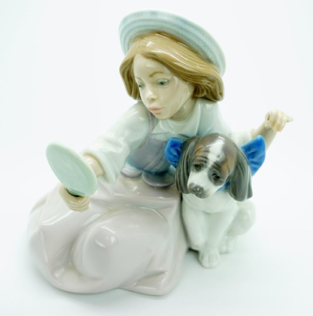 LLADRO "WHO'S THE FAIREST" FIGURINE: LLADRO "WHO'S THE FAIREST" FIGURINE Lladro figurine of girl look into a mirror sitting next to has dog. The bottom is marked "Lladro hand made in Spain Daisa 1987 5468 SB-2 MY". ; Measures: 5.75" H x 