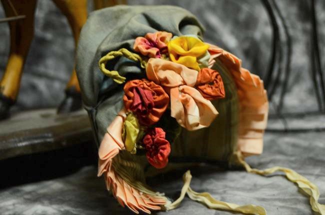 Ca 1890s AUTHENTIC PERIOD TEAL BONNET FOR JUMEAU BEBE !: CHARMING 1890'S BONNET. IN SHADES OF TEAL GREEN WITH CORAL PLEATED BRIM. COLORFUL FABRIC ROSES ARE A DELIGHTFUL ADDITION. RIBBON TIES. EAR TO EAR INSIDE CIRCUMFERENCE IS 10" WOULD LOOK BEAUTIFUL ON YO