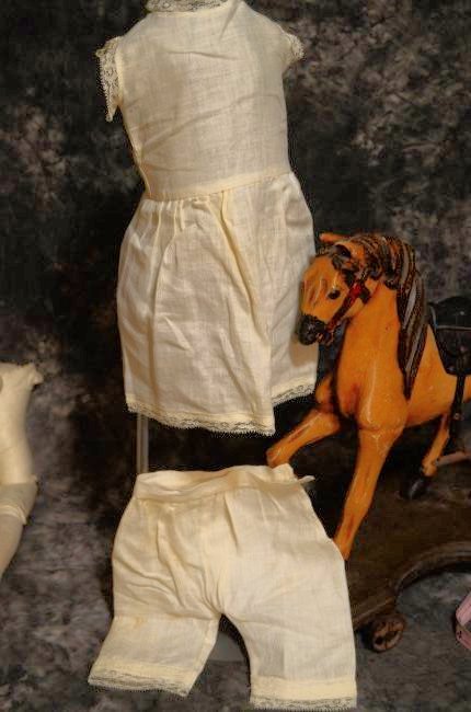ANTIQUE VINTAGE DOLL CLOTHING 18/21: ANTIQUE LINEN/MUSLIN DOLL SLIP AND PANT SET FOR ANTIQUE BISQUE HEAD DOLLS EDGED IN LACE CLEAN CONDITION WITH VERY LIGHT STAINING GREAT SET