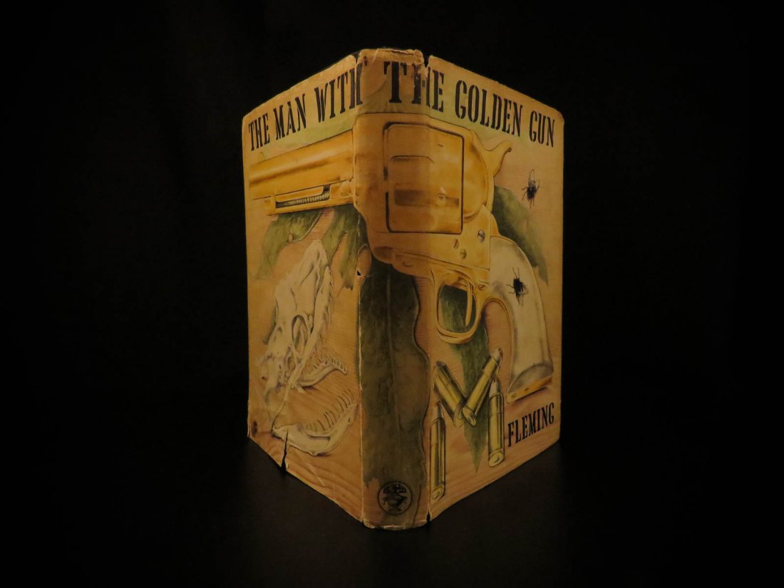 1965 1st ed JAMES BOND Man with the Golden Gun: 1965 1st ed JAMES BOND Man with the Golden Gun Ian Fleming Pistol NOVEL 007 + DJ The James Bond series focuses on a fictional character created in 1953 by writer Ian Fleming (1908 – 1964), who featu