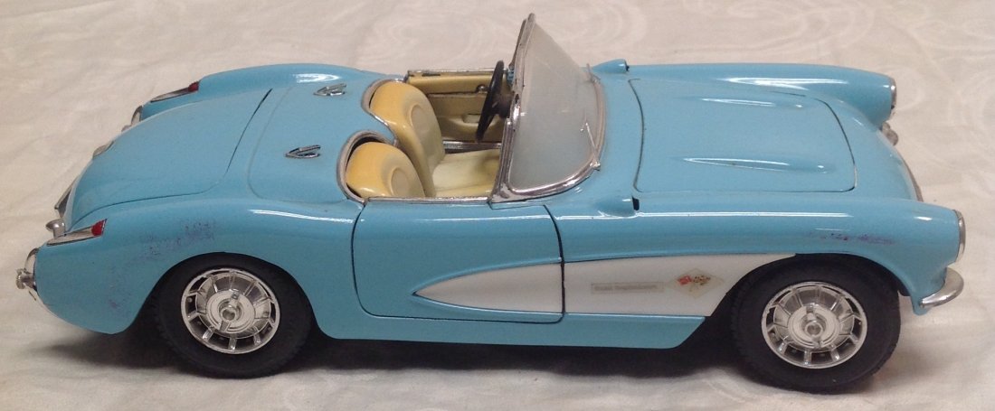 1957 Road Tough Toy Car: 1957 Road Tough Toy Car:1957 Replicia Chevrolet Corvette . Turquiose Metal Car. Measurement approximate: 10 x 4 In. Shipping cost: $ 15 excluding Hawaii, Alaska and California.