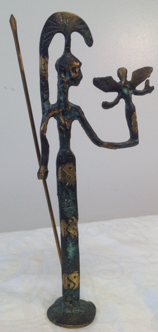 Egyptian Goddess 9.5 H: Egyptian Goddess with Spear in hand miniature statue. Material: Brass. Measurement approximate: 9 In. H. Shipping cost: $15 excluding Hawaii, Alaska and California