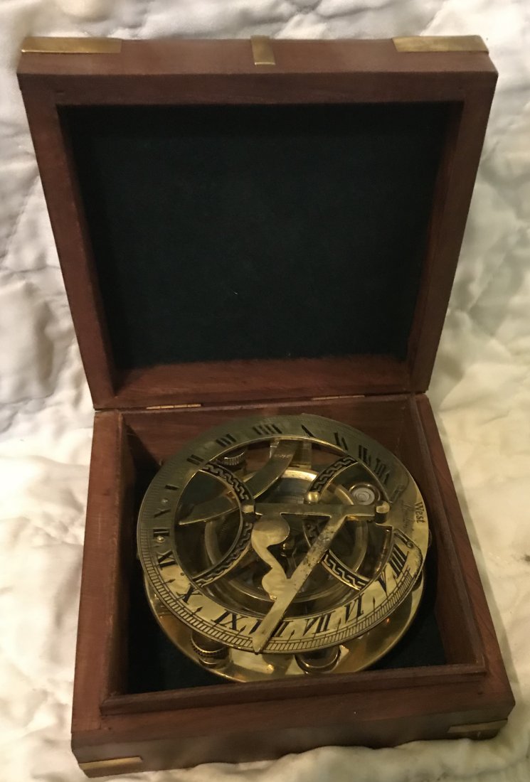 English Nautical brass compass in box.: English nautical compass in a box. Material: Brass. Measurements approximate: 6 H x 6 L. Shipping cost: $ 20.00 excluding Hawaii, Alaska & California
