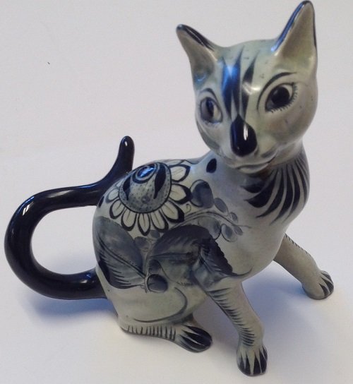 SIGNED PORCELAIN BLACK TAIL CAT FIGURINE-HAND PAINTED: Description:Gorgeous vintage hand painted black tail cat figurine - stamped and nicely finished DELFT STYLE. Material:Porcelain. Measurement approximate: 7.25 Long x 5 wide. Condition:Very good with n