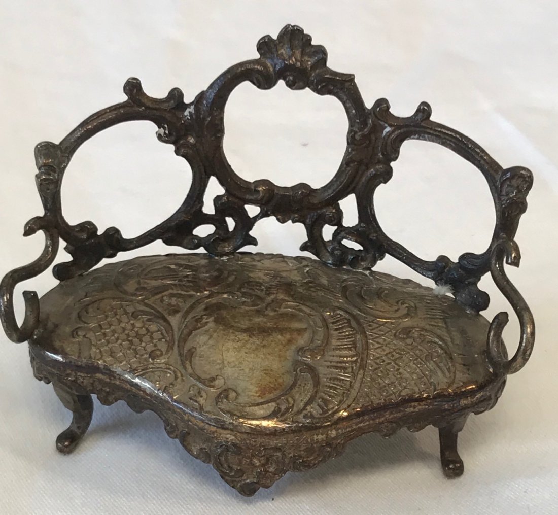 Vintage Miniature Silver Sofa: Description: Vintage Miniature Silver Sofa. Measurement approximate: 1.25 H X 2.5 W. Material: Silver plate.Shipping Charges $10 USA Only.