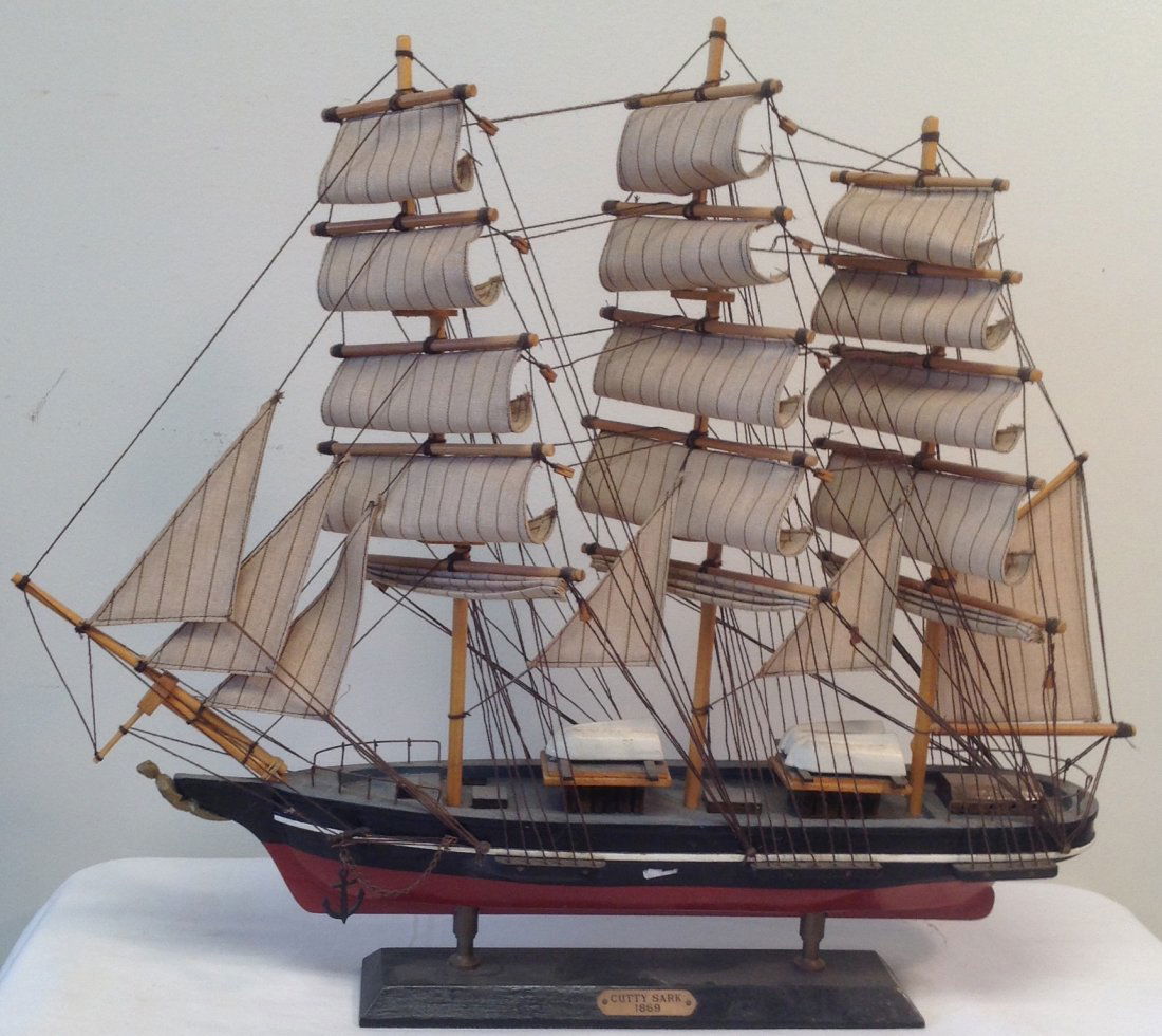 Cutty Stark Sail Boat Model 21 x 18: Cutty Stark sail boat model. Material: Wood and fabric. Measurement approximate: 21 H x 18 L x 4 W. Shipping cost: $30.00 excluding Hawaii, Alaska & California. Note: This item has no reserve