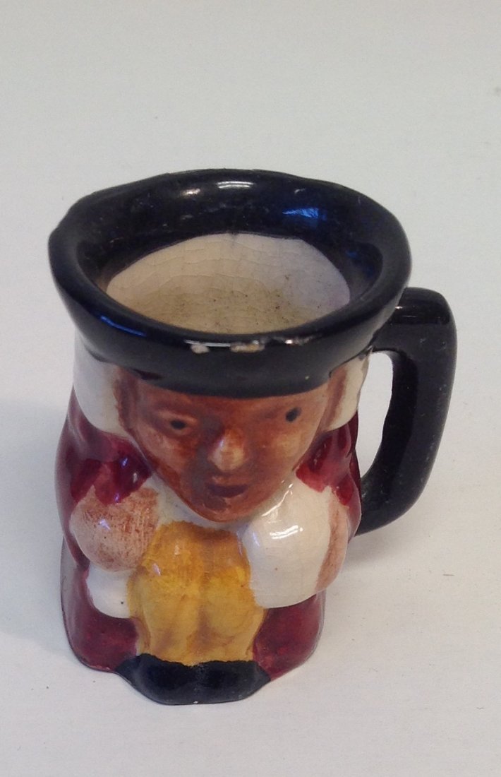 Vintage Cute English Staffordshire Mug / Stamped: Description: Vintage Stamped Demitasse Coffee Cup of English Person. Material: Porcelain/Ceramic. Measurement approximate: 2 Tall.Shipping cost: $10 excluding Hawaii, Alaska & California Note: This it