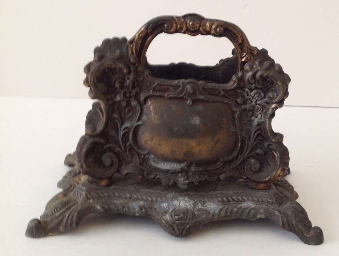 Antique Baroque Letter / Napkin Holder /Numbered: DESCRIPTION: Vintage heavy baroque letter holder or napkin holder with decorative accents. Dimensions approximate: 5 H x 7 long x 4 Depth. Material: Metal .Shipping cost: $18 excluding Hawaii, Alaska 