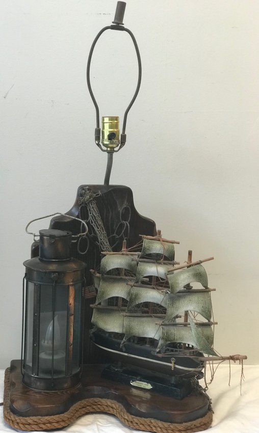 Vintage Lighthouse and Whaling Ship Clipper 1846 boat: Description: Lighthouse and Whaling Ship Clipper 1846 boat lamp.Material wood and glass. Measurement approximate: 18 H X 14 W X 9 D. Shipping Charges $65 except to Alaska,Hawaii,California.
