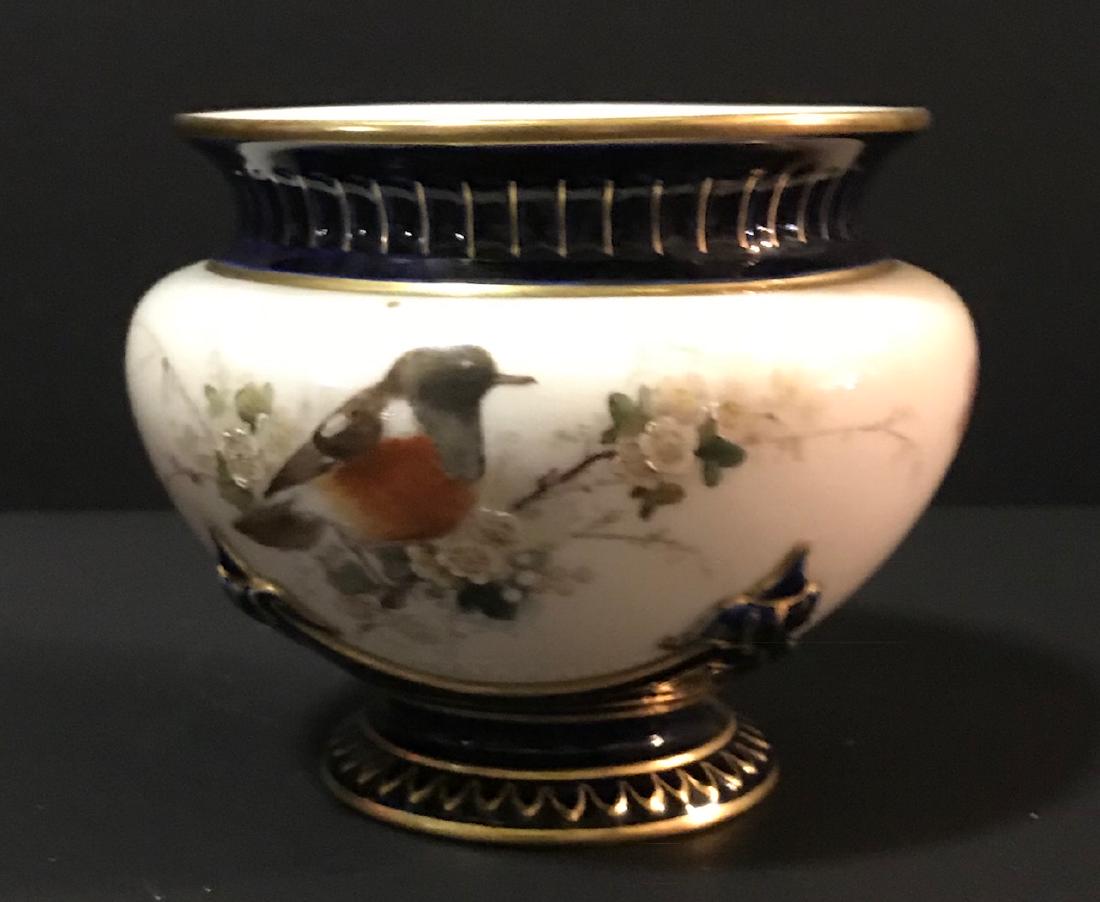 Royal Worcester Dish 5 H: Description: Royal Worcester dish with a hairline defect. Measurement Approximate: 5 H. Material: Porcelain. Shipping Cost $17 Excluding California, Alaska & Hawaii.