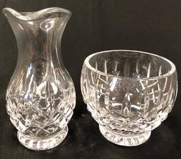 Waterford Crystal "Araglin" Open Sugar and Creamer Set: Description: Make every day a special occasion with this Waterford Crystal Araglin pattern open sugar bowl and creamer two-piece set. Material: glass. Measurement: approximate 3.5"w x 4"h