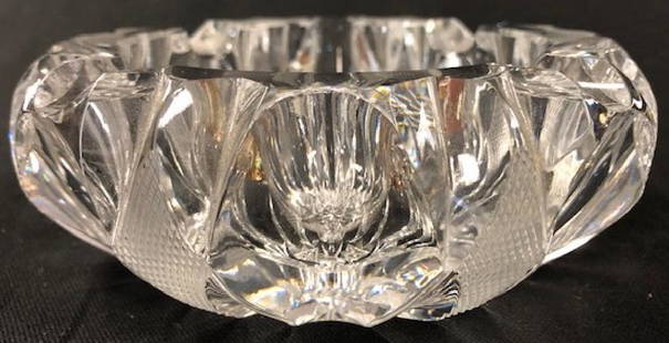 Bliekristall Lead Crystal Ashtray: Description: Bliekristall lead crystal ashtray; robust with nice heft. Exquisite starburst etching on bottom. Material: glass. Measurement: approximate 3"h x 4"w (INCHES). Shipping cost: $25.