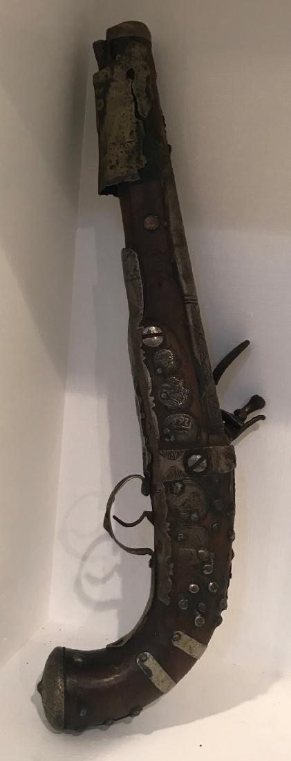 Antique Early 20 the Century North Africa Pistol: Description: Antique Early 20th Century North Africa Pistol. Measurement approximate:14 H (Inches). Material: Metal. Shipping cost: $30. except to California, Alaska & Hawaii