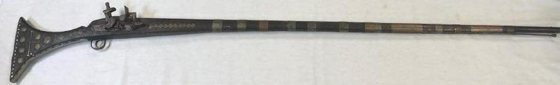 4 Antique Moroccan Hand Crafted Rifles: Description: Antique Moroccan rifles. Hand crafted from wood and metal with traditional style, decorative bone inlay throughout. Over a century old; Material: wood; metal; bone. Measurement: approxima