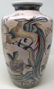 Beautiful Pale Pink Japanese Vase: Description: Lovely and unusual; beautiful Japanese porcelain vase with lilac tinted florals, cherry blossoms and birds in blue over a pale pink background. Nice high glaze finish and color palette.