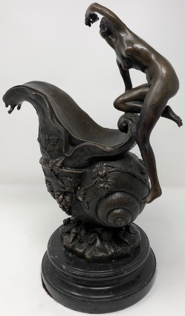 Henri Fugure-Style Bronze: Description: This Henri Fugure-style deco/nouveau style bronze is a delightful depiction of a nude nymph atop a horn of plenty, set on a dark green marble base. Very striking. Material: bronze; marble