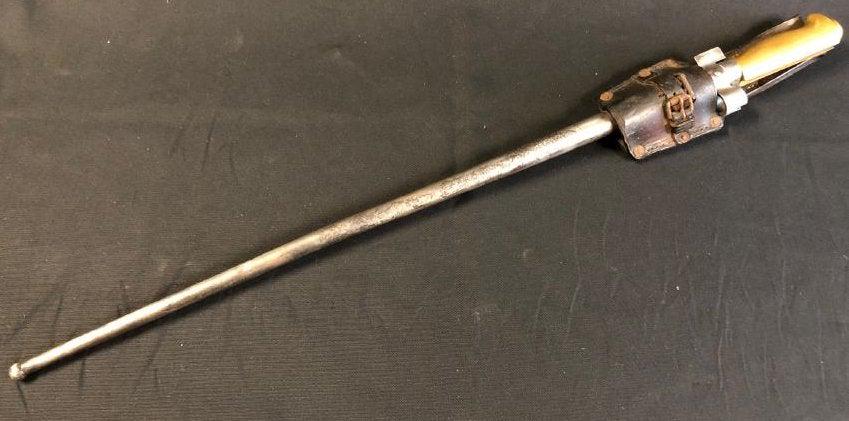 Shortened French WWI Era Lebel Bayonnet: Description: Shortened French WWI era Lebel metal bayonet with brass hilt, metal scabbard and leather sheath. Signed; includes serial numbers. Material: brass; metal; leather. Measurement: approximate