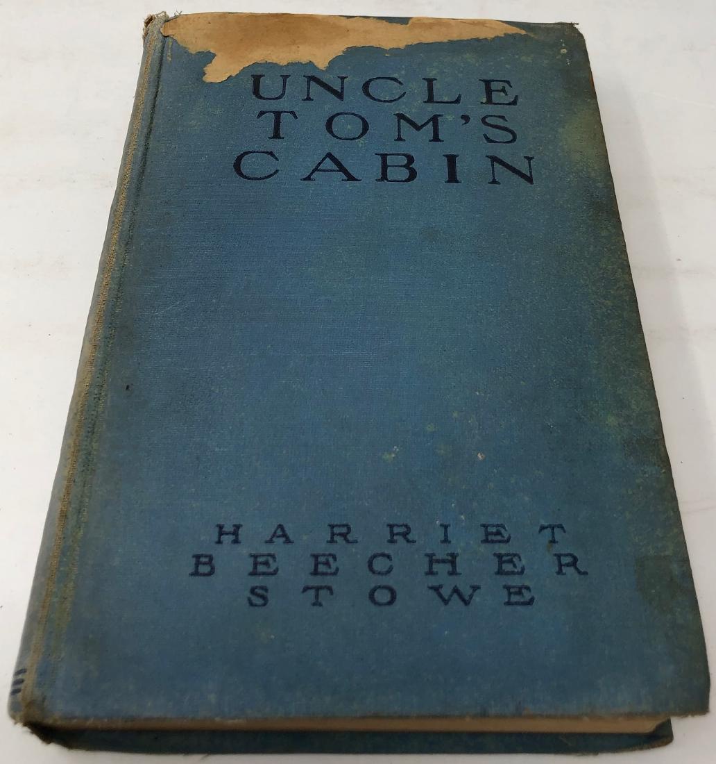 Antique Edition of Uncle Tom: Description: Antique Grossett & Dunlop edition (prob 1920) of Harriet Beecher Stowe's Uncle Tom's cabin. Hardcover; wear issues reflective of use and age. Material: paper. Measurement: approximate 8"h
