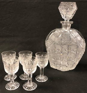 Stunning Victorian Era Cut Glass Decanter with 5: Description: Stunning antique cut glass decanter with stopper and 5 aperitif-sized, stemmed glasses. Most probably circa 1890's. Just fabulous Victorian-age craftsmanship and artistry. Material: