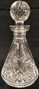 Signed Waterford Crystal Decanter with Stopper: Description: Signed Lismore Waterford cut crystal decanter with stopper. Vintage and distinctive; timeless and always elegant. Waterford mark on front toward base of decanter. Material: lead