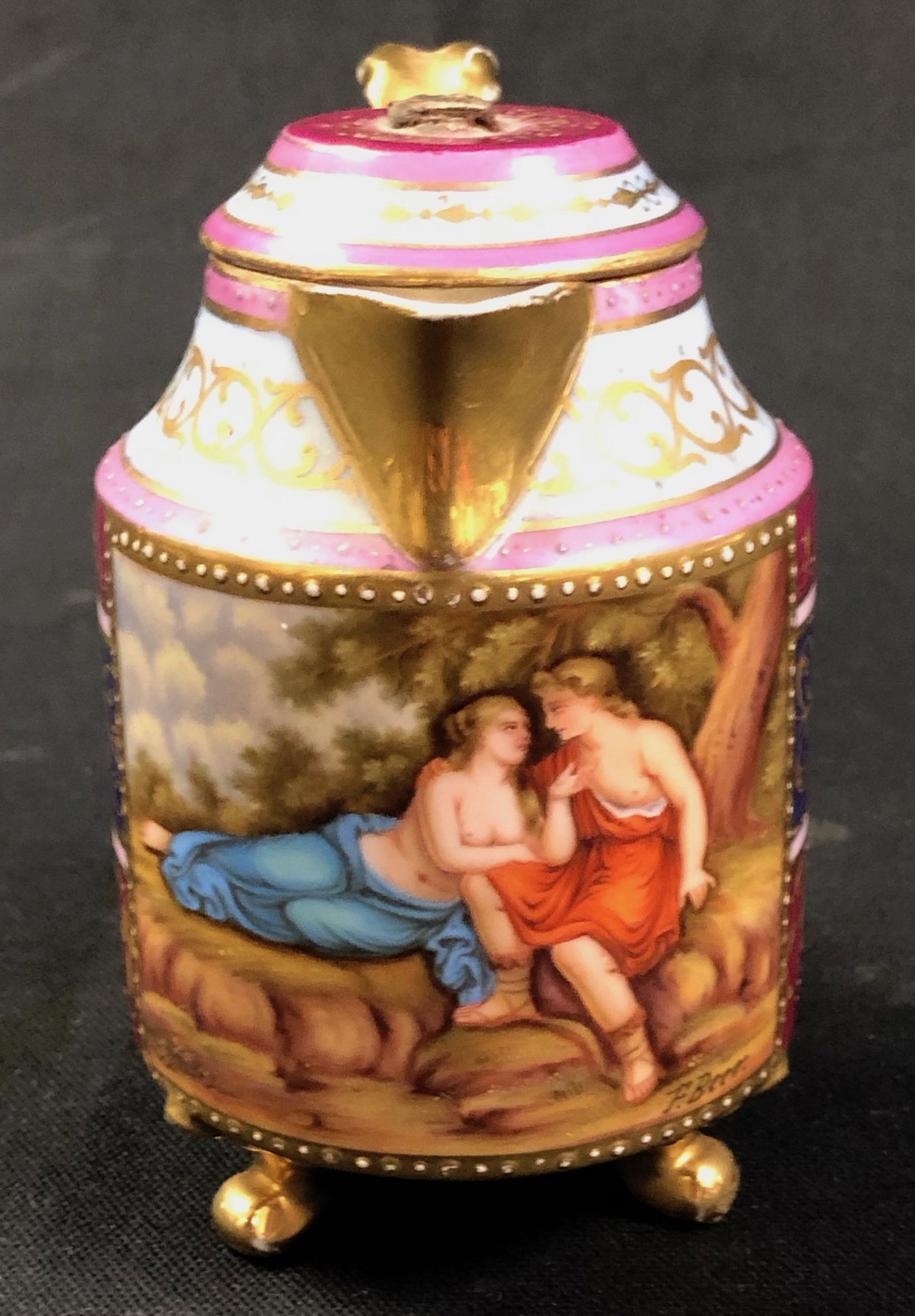 Antique Petite French Porcelain Teapot: Description: Petite French porcelain teapot, hand painted with gilt and a traditional romantic theme. Footed and with lid, missing finial. This is a lovely item with some age and is inscribed with Rom