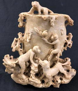 Asian Soapstone Carved Vase w/Monkeys: Description: Glorious soapstone carving featuring monkeys clambering over a vase carved to resemble a hollow tree. Material: soapstone. Measurement: approximate 8"h x 9"w x 5"d (INCHES). Shipping