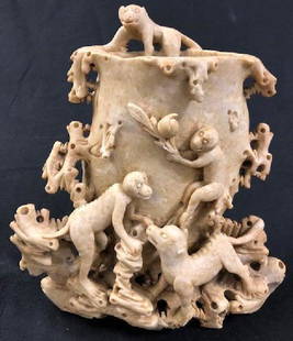 Asian Soapstone Carved Vase w/Monkeys: Description: Glorious soapstone carving featuring monkeys clambering over a vase carved to resemble a hollow tree. Material: soapstone. Measurement: approximate 8"h x 9"w x 5"d (INCHES). Shipping cost