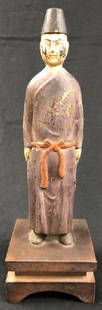 Antique Chinese Carved Wood Figurine: Description: Antique Chinese figurine gentleman wearing an inscrutable expression and native attire, hand carved in wood, with original paint. Material: wood. Measurement: approximate 12.50"