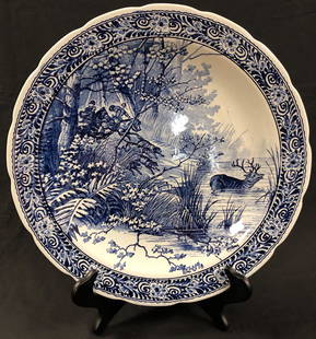 Antique Royal Sphinx Delfts Platter: Description: Antique Royal Sphinx Delfts platter, signed on underside, depicting a hunt scene in blue over white. Large round size, featured slightly scalloped edges and a nice high gloss glaze. One