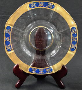 Vintage Glass Charger Plate with Gold Rim: Description: Vintage glass charger plate with gold rim and pretty cobalt blue detail. Scallop pattern in glass, nicely accented by gold and blue colors. Material: glass. Measurement: approximate