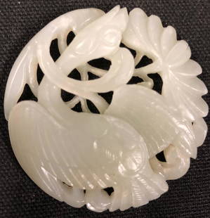 Carved Jade Plaque/Pendant: Description: Carved jade plaque/pendant with one side detailed and the other smooth. Carved from a very pale green celadon-hued jade. Jade has been the most highly esteemed stone in China throughout