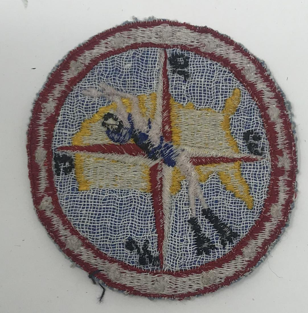 Scuba Diver with flippers sew on patch: Description: Scuba Diver with flippers sew on patch, compass points and map of USA, red, white, blue, gold with NSEW compass point lettering in black 3 inches round approx., used