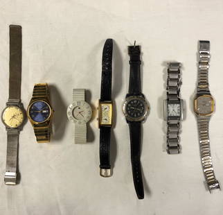 Collection of Vintage Men: Description: Excellent assortment of vintage men's watches; set of 7. Includes a stylish Kronotron Electra, 2 Sharp watches, Lorus Sport, Seville, Avalon, and Voges. Material: meta;; glass; leather.